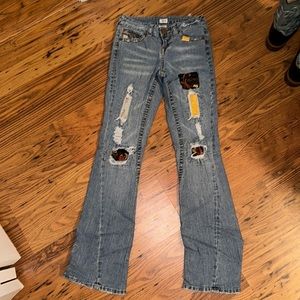 Cache Patchwork jeans